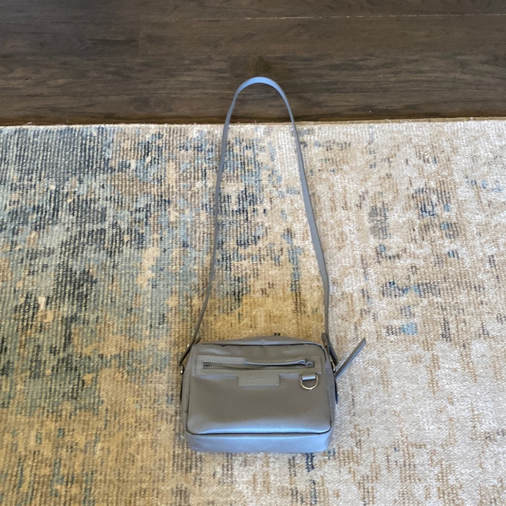 LongChamp grey bag can be worn as cross body or shoulder bag
